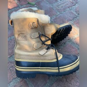 Sorel Tan and Black Snow Boots